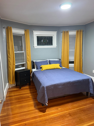 Comfortable private bedroom is fully furnished with bed, dresser, and desk making it Move-in ready. - Fully Furnished Rooms Near UMass Boston-Utilities Included