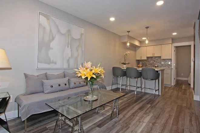 Living area (different furniture) - Spring Semester 2026 Sublease: Private Room with attached 3/4 bath in 3-bedroom townhouse