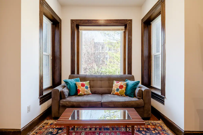 living room - 3 Queen Beds in Fully Furnished 2BR/1BA Move-In Ready w/ Monthly Cleaning Apartments