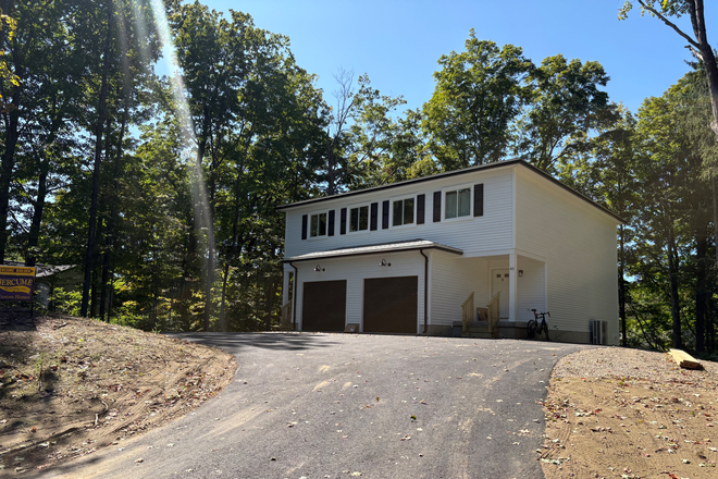 Exterior - Beautiful, brand new construction at Cushman Village. Duplex