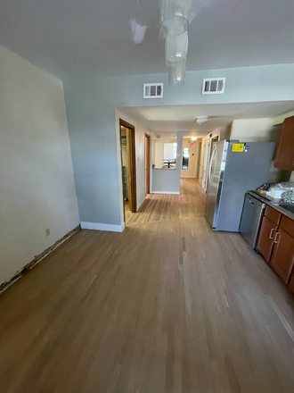 Living room - Looking for 2 male roommates to share a 3 bedroom apartment
