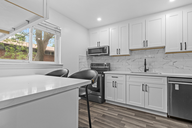 Newly Renovated Kitchen With New Appliances - 3 Separate Rooms Available in a Shared Townhouse - Unfurnished with Laundry