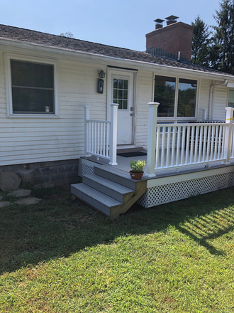Front deck - Private spacious home with large fenced yard