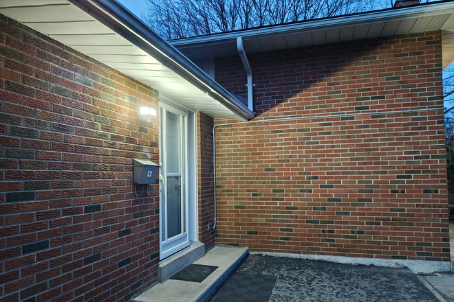#52 Entrance - 4 Furnished Bedrooms • 2 Full Baths • Split‑Level Brick Bungalow