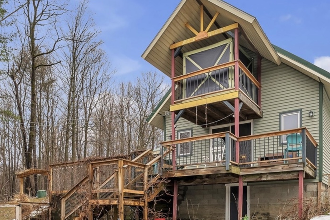 Back view of home - ENTIRE Lakehouse with LAKE ACCESS in HINESBURG