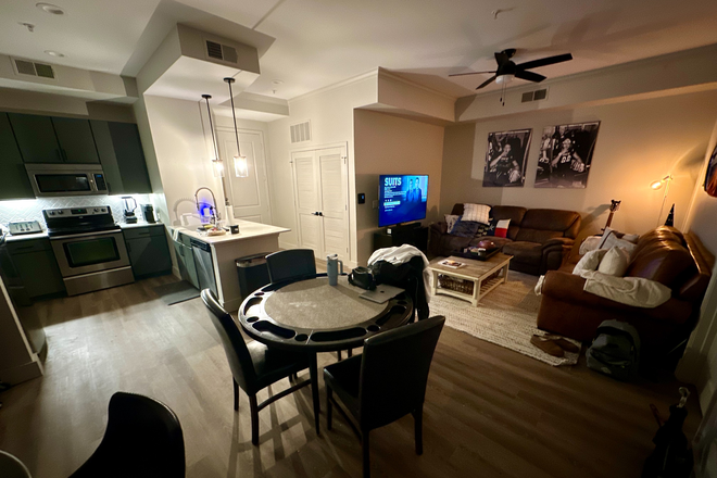 Living room and kitchen - La Maison River Oaks Apartments