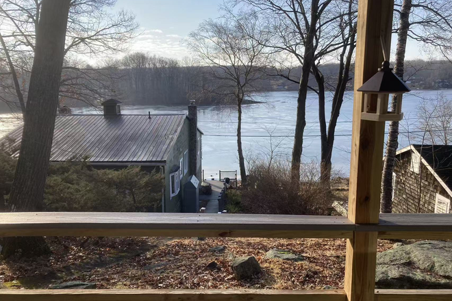 view to the lake from front porch - Beautiful 2b1b lakeside cottage Apartments