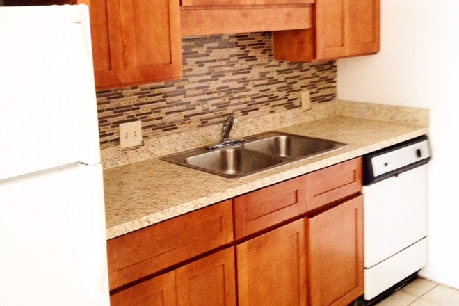 Kitchen - Large 1/1 or 2/1 apt with private patio and W/D near UF campus