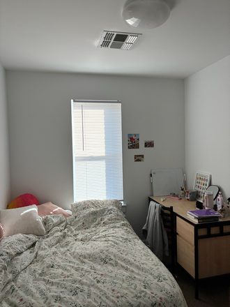 Bedroom, comes pre-furnished with bed, desk, and dresser - South Campus Commons 7