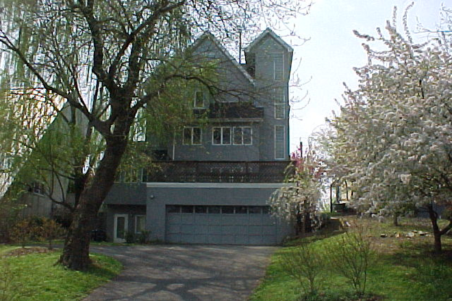House and Garage from the Street; Apartment Door is on the left - Sweet 1 Bedroom Apartment on nearby MacArthur Blvd.; blocks to GU