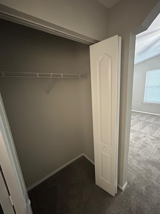 Closet - The Great Reserve at Tampa Palms Apartments