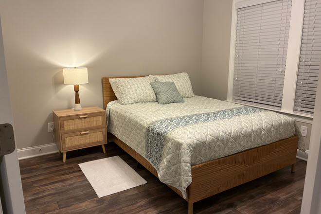 Bedroom, queen bed, nightstand, dresser and full closet. - Furnished private room, shared bathroom, common area & kitchen.