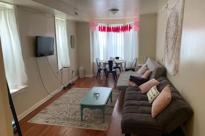 Living room - Modern 3BR/1BA Apartment Just Steps Away from Temple!