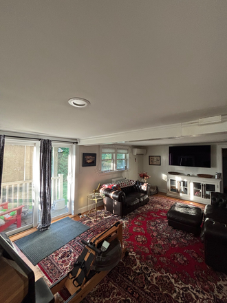 Another view of the roon + little patio and full walk out yard - Large Studio Room Newton near major public transportation.  Easy commute: Cambridge, BU an