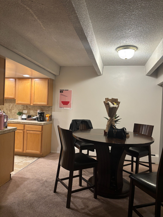 Dining room, patio to the right not pictured. Furnished. Text or Call for more Photos - Meadows Apartments