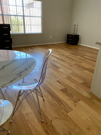 Spacious open room with wood floors - Garage Apartment in safe, quiet neighborhood