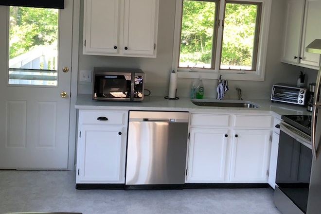 Kitchen with door leading to large deck - 42 Joy Lane Narragansett, RI 02882 Duplex