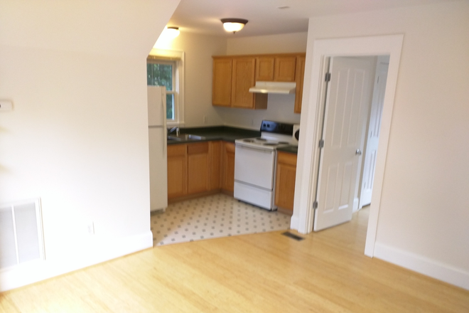 Another view of the kitchen and bedroom door. - Carriage House 1/2 Block to Duke. Private Parking/Laundry. Some Utils Incl. Quiet & Very Walkable.