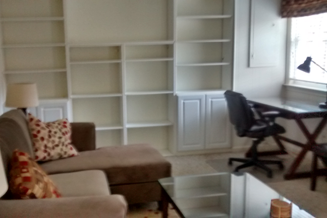 Living room with desk - Furnished 1BR apartment close to GMU and downtown Fairfax City