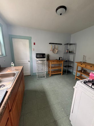 Kitchen ( Microwave included) - 3 bed 1 bath. LOOKING FOR 2 SUBLETTERS FOR JAN- MAY 26 w/ option to renew lease for the next Townhome