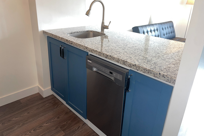 Sink and dishwasher - Bright 1-bedroom with balcony — Rent controlled · All utilities included · Furnished or unfurnished Condo