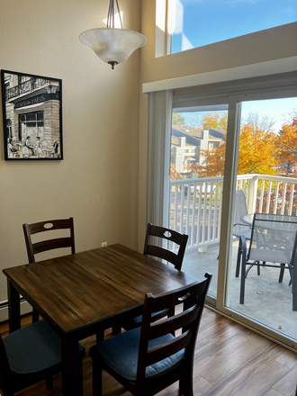 Dining area adjacent to the balcony area - 3095 29th Street/Winds 11 Condo's.  Fully furnished executive style condo