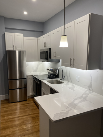 Call NOW for showings! 617-236-8600 - THE FENWAY - HUGE RENOVATED 1ST FLR 4BR FOR *9/1/2025* W/ 2 BATHS, H&HW INC, LNDRY ON SITE, ELEVATOR Apartments