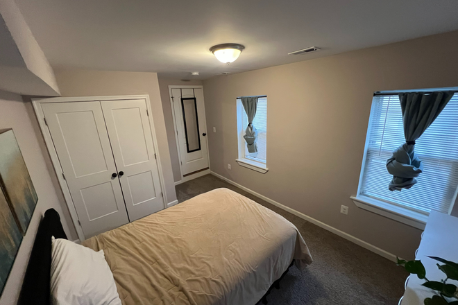bedroom - Furnished bedroom in welcoming home one mile north of Hopkins Hospital