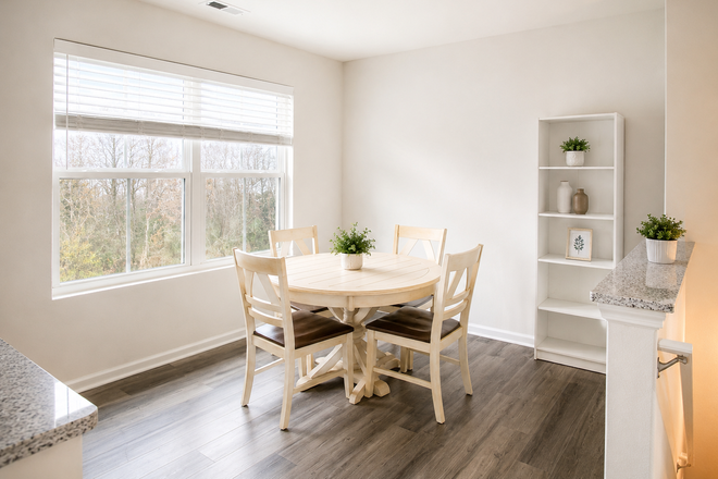 Dining area with natural light - Furnished 3BR Near Duke Hospital | Garage + Utilities Included Townhome