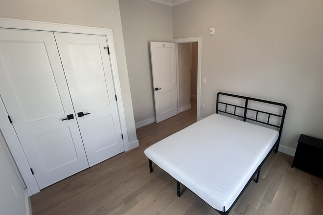 Visit hubrealtyproperties.com - Roommate Matching Program, furnished room with all utilities and wifi included, handy to the T Apartments