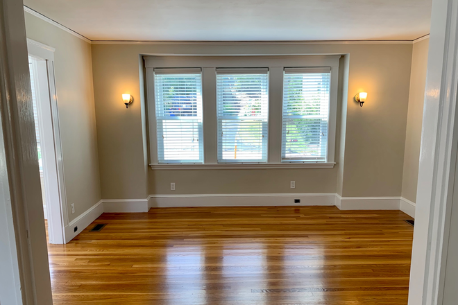 Living room with great light! - Renovated 1,900 Sq Ft Arlington Heights Home | 3BR + Office | Garage | Bus to Harvard Sq