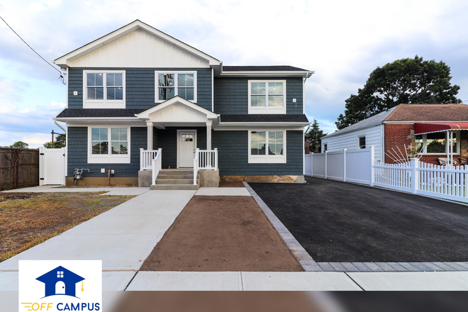 Front of House - Newly Available 6/1/26! Newly Renovated 8 Bedroom and 4 Bath House