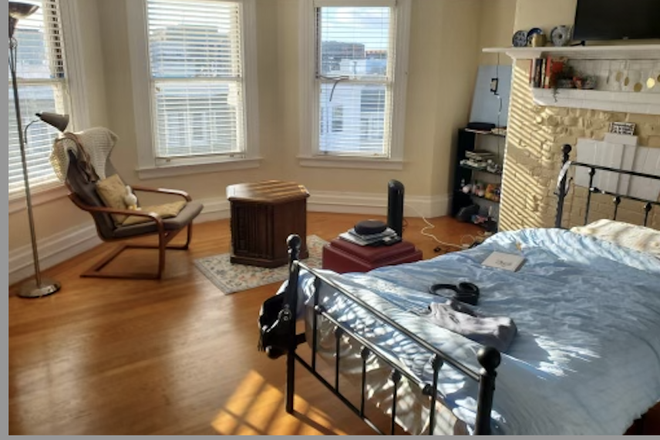 The partially-furnished spacious bedroom - Room available close to campus!