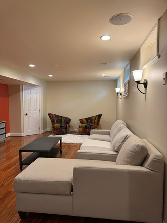Living Area - Large furnished private walkout basement for rent $1,200 including utilities House
