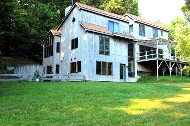 The apartment is all of the windows and doors on the ground level - One-Bedroom Separate Apartment in Country Home