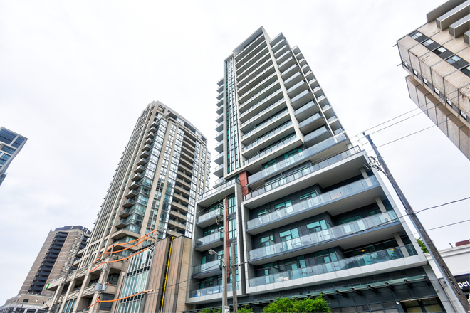 View of the building - Stunning corner unit: amazing location (minutes from subway/campus) + all utilities included! Condo