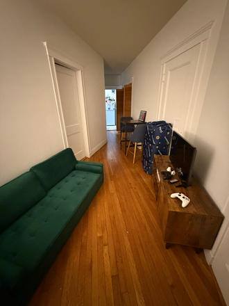 Living Room - Subletting a Private room in a 2 bed, 1 bath apartment. 4th on 143 Park Dr for $1700