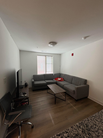 Living Room with TV - Tempo Apartments - D6 Floor Plan Apartment Room - Fully Furnished