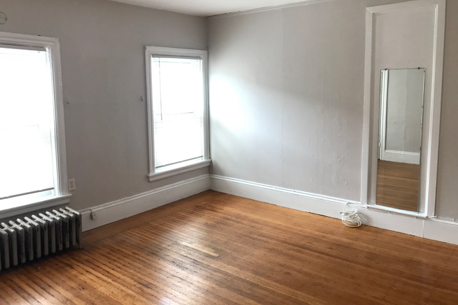 Living Room - 1 Bedroom Apartment, Full Living Room. Hardwood Floors. Utilities Included. Walk to Brown.