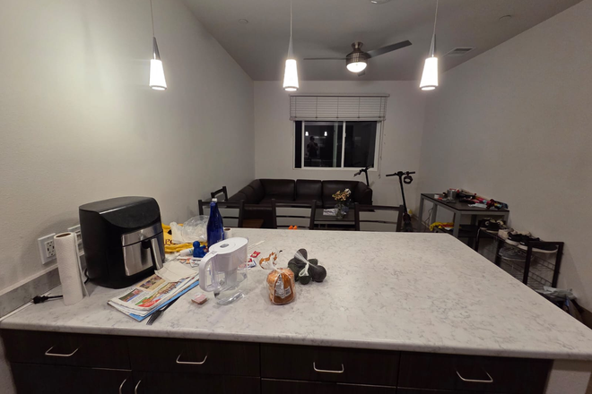 View of Living Room from Kitchen - Summer Sublease - 1 bed, 1 bath property in Plaza Verde - Looking for UCI Student (Undergrad, Male)