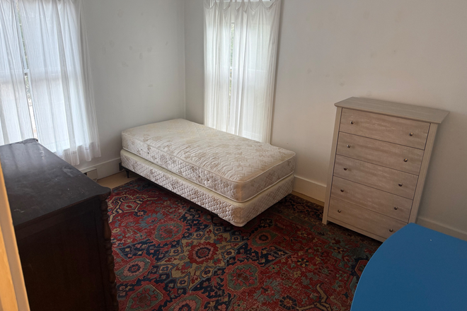 bedroom with bed and windows - Spacious 1 BR suite in Newton Center for Caregiver/Roomer House