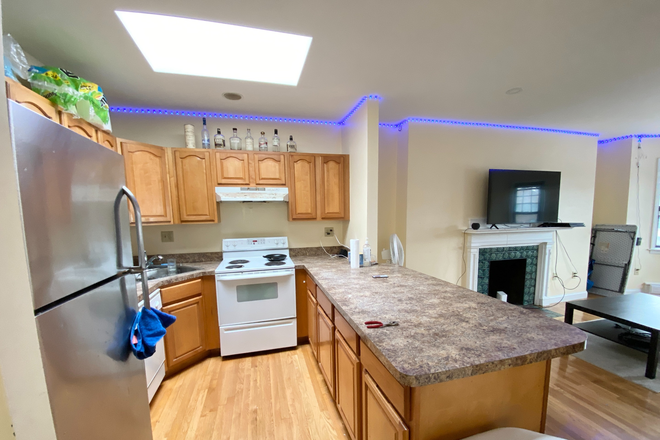 Living Room and Kitchen - Great Location, updated kitchen, open layout Apartments