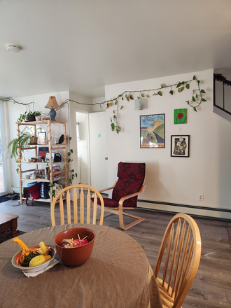 Open concept first floor, door visible is downstairs bathroom - Apartment at Canyon and 19th