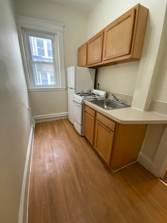visit hubrealtyproperties.com - Allston, spacious one bedroom split apartment, on Griggs T stop green line