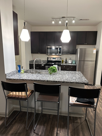 Kitchen - Signature 1505 Apartments