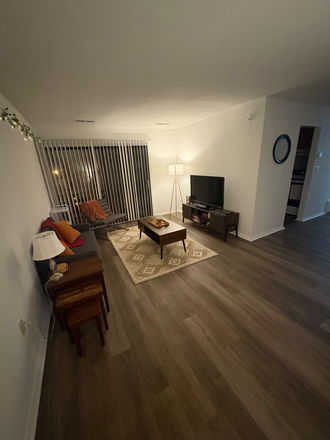 Living room with balcony - Apartment At Foxridge!!