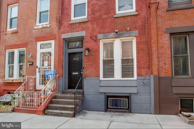 Brick and Gray Trim - 1814 N Bouvier St. 6 Bedroom/3 Bath. Spacious Rooms and Living Area. Inside Patrol Zone House