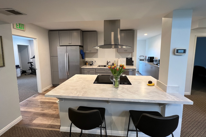 Kitchen includes pots, pans, dishes, utensils and an assortment of small kitchen appliances. - Private Room with Shared Bath & Close to Trolley.