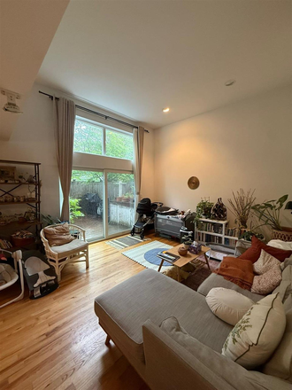 Living Room - ~ Modern Magoun Sq Townhouse w/ Parking + In Unit Laundry + Patio ~