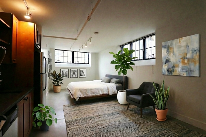 sleeping/living area - Awesome modern JP studio with parking - Feb 1st Apartments